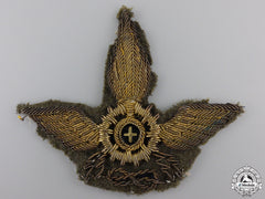 An Italian Colonial Forces Motorized Unit Cap Badge