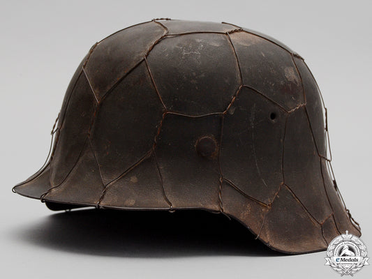 an_m42_army(_heer)_helmet_with_wire&_named_an_m42_army__hee_55ba491753915
