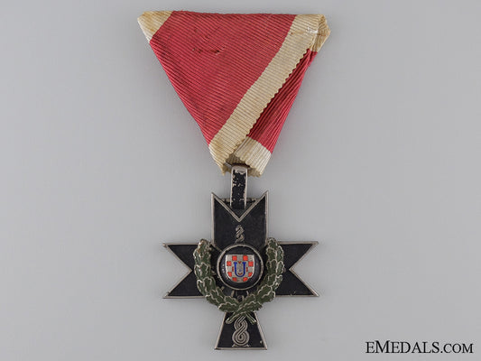 an_order_of_iron_trefoil4_th_class_with_oak_leaves_an_order_of_iron_53c03ac0d4ca8