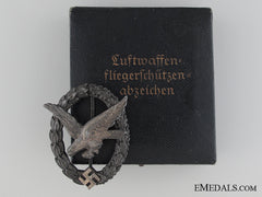 A Cased Unqualified Air Gunners Badge