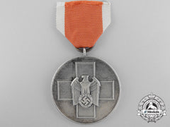 An Early Social Welfare Medal In Tombac