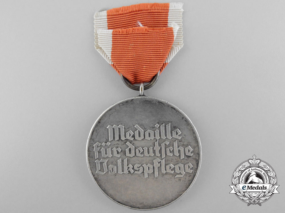 an_early_social_welfare_medal_in_tombac_b_0240