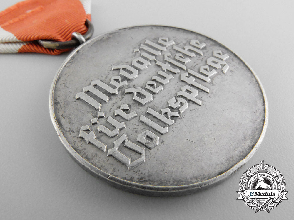an_early_social_welfare_medal_in_tombac_b_0242