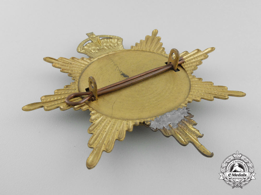 a57_th_regiment(_peterborough_rangers)_canadian_militia_helmet_plate_c.1908_b_114