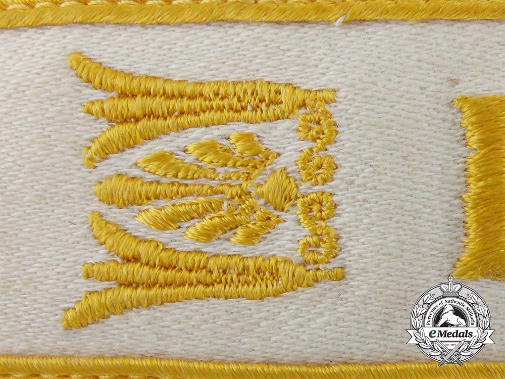 a_tunic_removed_kreta_campaign_cufftitle_b_1353