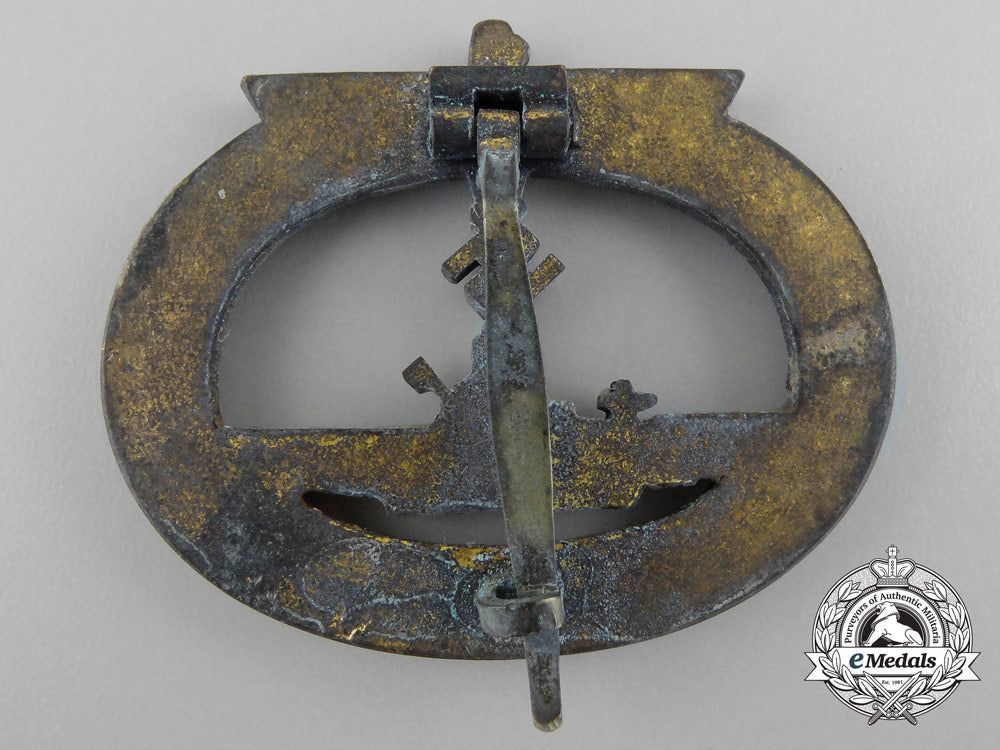 a_worn&_early_kriegsmarine_submarine_war_badge_by_schwerin_b_2254