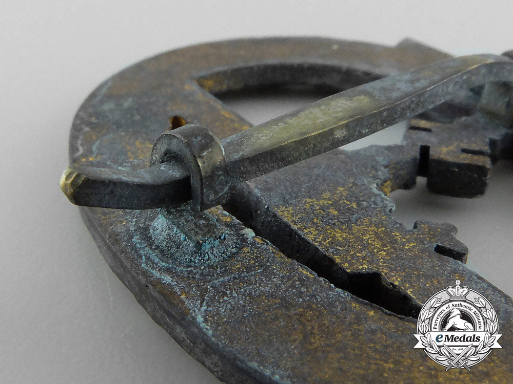 a_worn&_early_kriegsmarine_submarine_war_badge_by_schwerin_b_2257