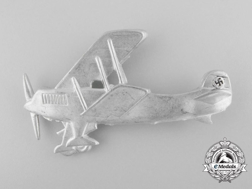 a1933-35_german_aluminum_patriotic_plane_badge_b_2296
