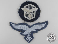 Two Luftwaffe Uniform-Worn Embroidered Insignia