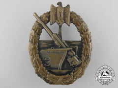 A Kreigsmarine Naval Artillery Badge By Juncker