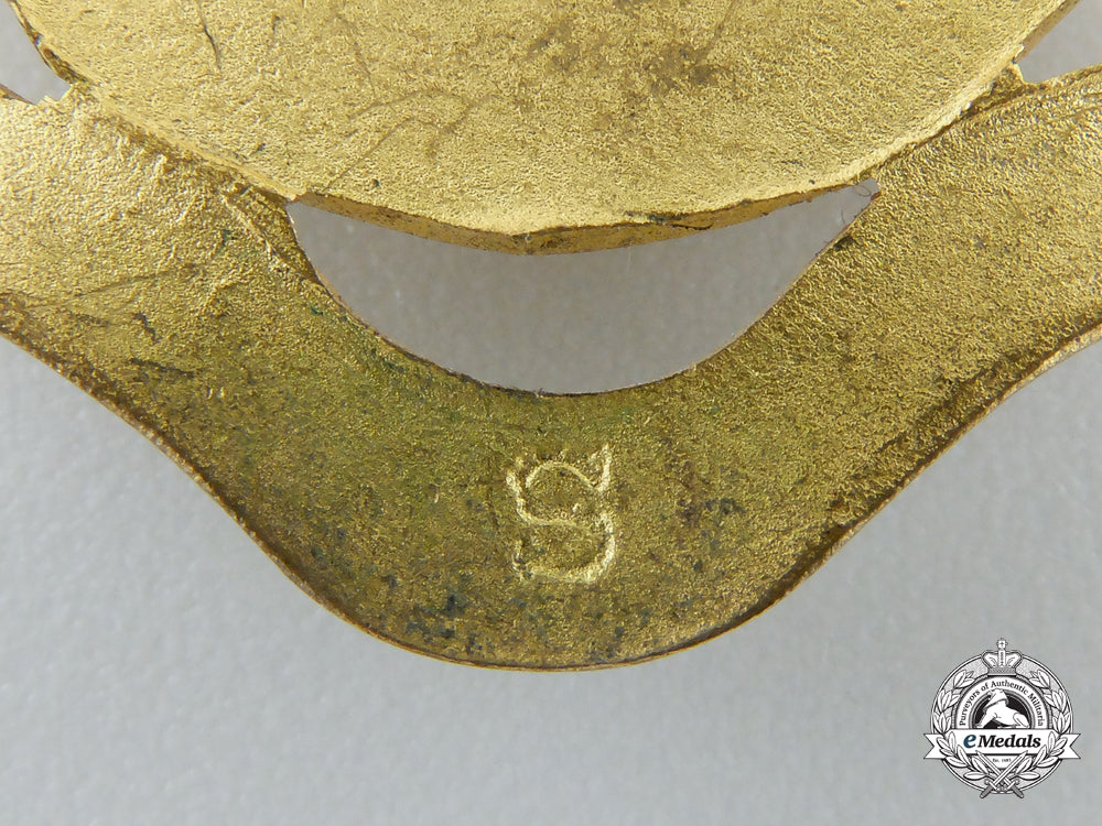 a_second_war_lincoln&_welland_officer's_cap_badge_b_434