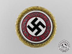 A Large Golden Nsdap Party Badge By Deschler & Sohn; Number 12877