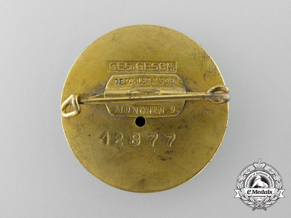 a_large_golden_nsdap_party_badge_by_deschler&_sohn;_number12877_b_4901