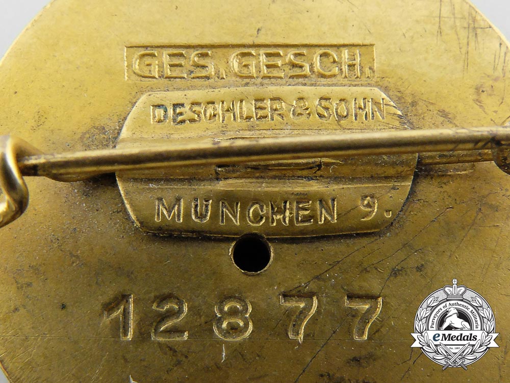 a_large_golden_nsdap_party_badge_by_deschler&_sohn;_number12877_b_4904