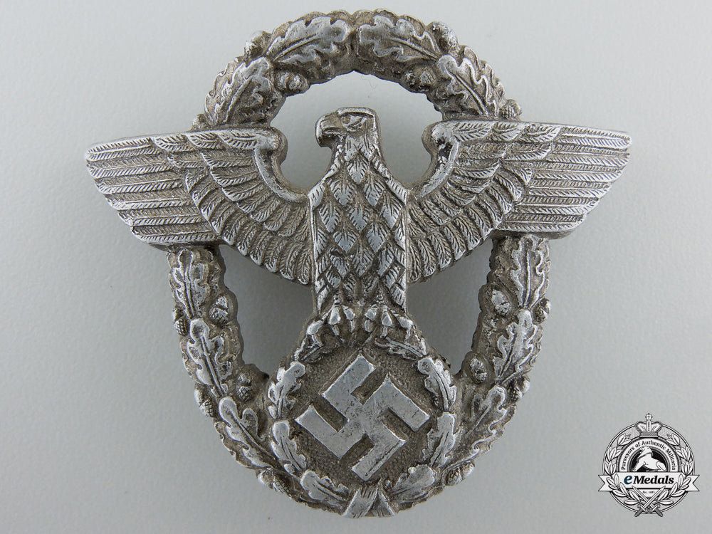 a_second_war_period_german_police_cap_badge_by_assmann_b_619