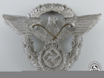 a_second_war_period_german_police_cap_badge_by_assmann_b_620