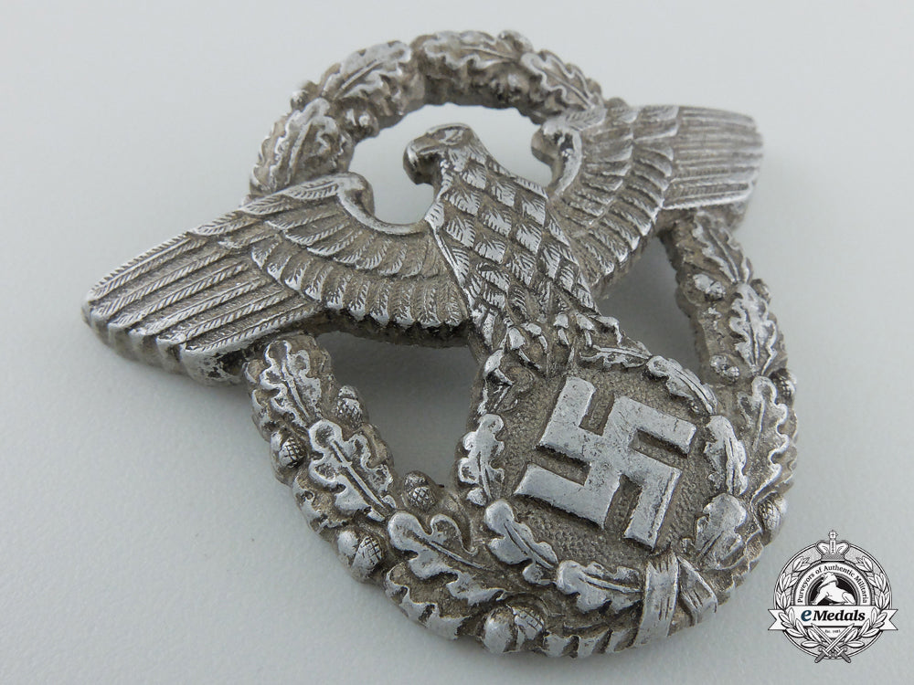 a_second_war_period_german_police_cap_badge_by_assmann_b_621
