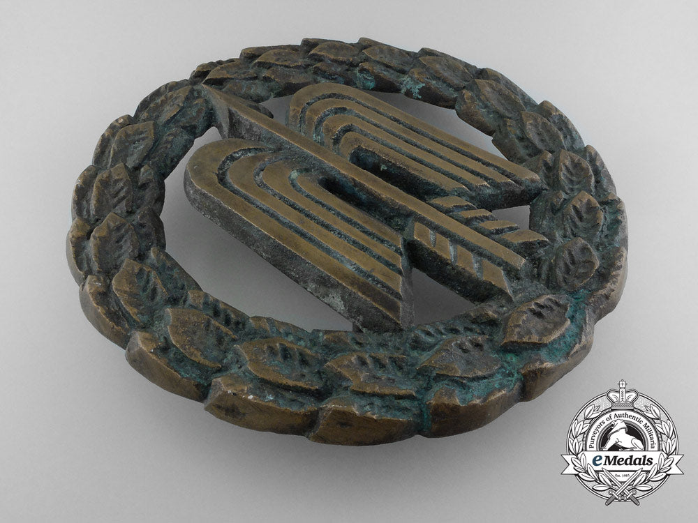 a_large_bronze_luftwaffe_fighter_squadron_emblem_from_ground_base_gate_b_6418