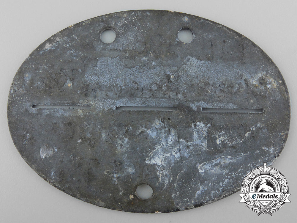 a_second_world_war_identification_tag;_air_fleet1_in_lithuania_b_7174