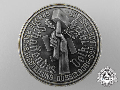 a1937_reich’s_exhibition_of_a_productive_people_badge_b_7993