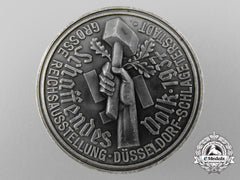 A 1937 Reich’s Exhibition Of A Productive People Badge