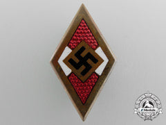 An Hj Golden Honor Badge