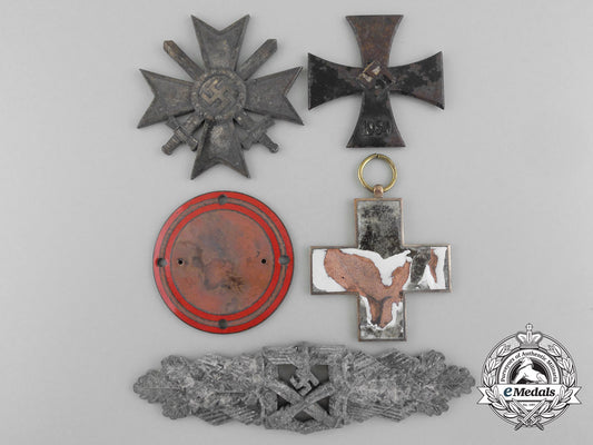 a_lot_of_german_medls,_awards,_and_order_parts_from_the_destroyed_zimmermann_b_9103