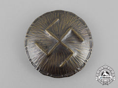 A Third Reich Period German Swastika Runic Badge