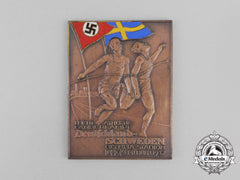 Germany, Third Reich. A 1937 Germany Vs. Sweden Athletics Competition In The Olympia Stadium Medal