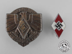 A Grouping Of Two Hj Badges