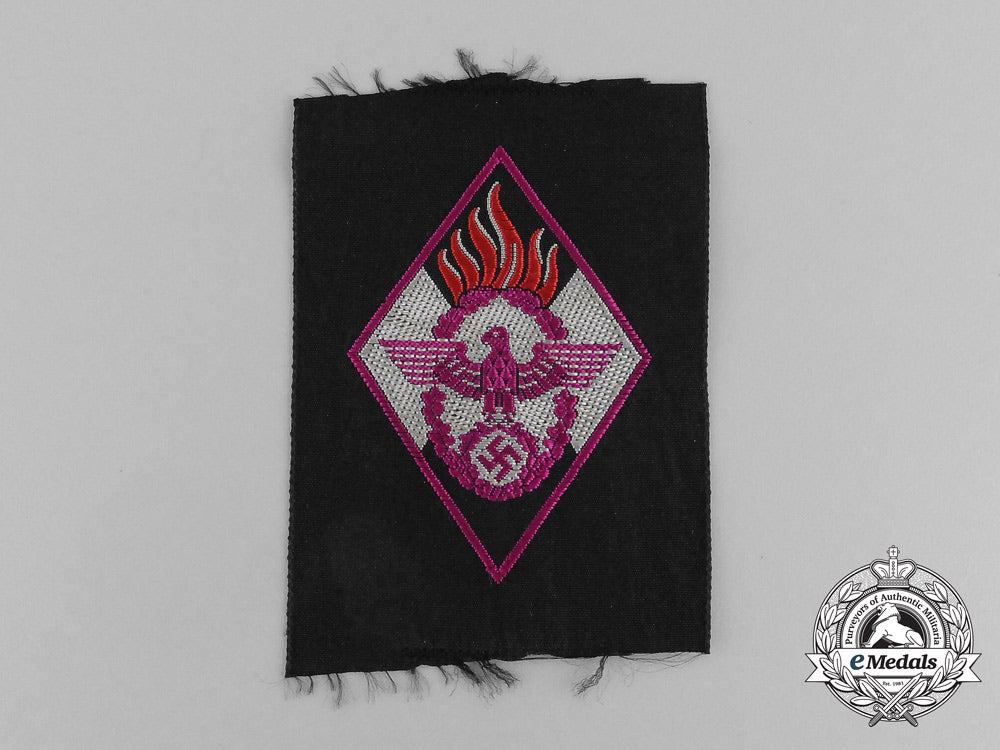 a_mint_and_unissued_hj_fire_defense_sleeve_patch_bb_0191