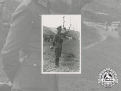 A Wartime Period Photo Of A Dkg Recipient In The Field