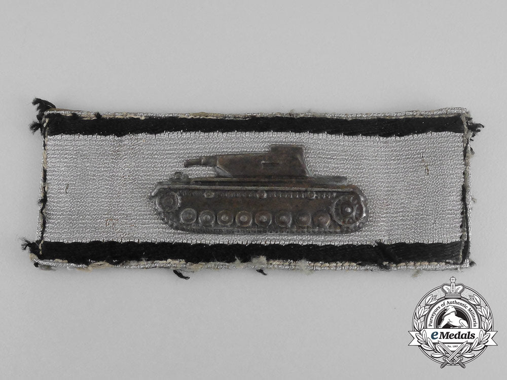 a_silver_grade_badge_for_single-_handed_tank_destruction;_uniform_removed_bb_0447