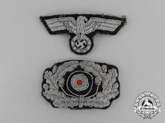 Two Wehrmacht Heer (Army) Visor Cap Insignia