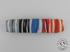 A Bavarian Medal Ribbon Bar With Five Medals, Awards, And Decorations
