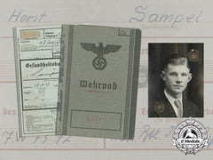 A Wehrpaß & Health Record To Wound Badge In Silver Recipient