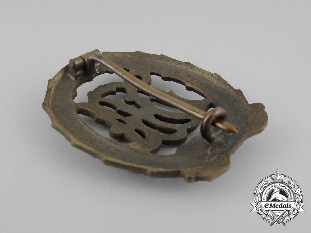 a_bronze_grade_drl_sports_badge_with_matching_stick_pin_by_wernstein_of_jena_bb_1557