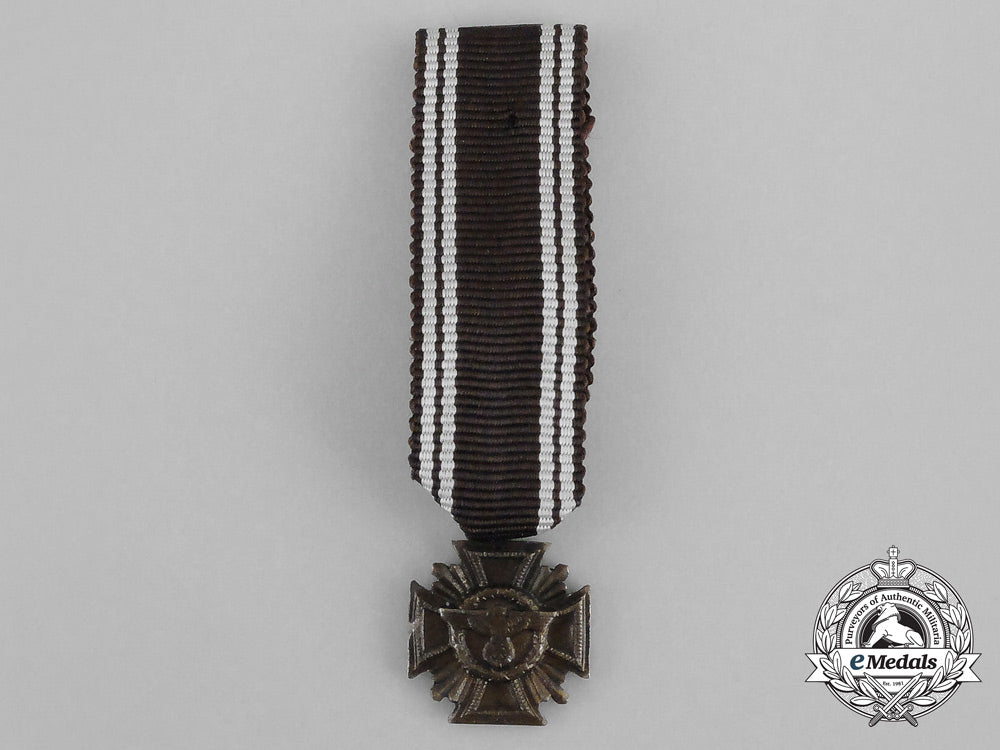 a_mint_nsdap10-_year_long_service_medal_with_matching_miniature;_heavy_version_bb_1566