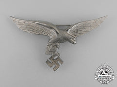 Germany, Luftwaffe. A Condor Legion Droop-Tail Tunic Breast Eagle By C. E. Juncker