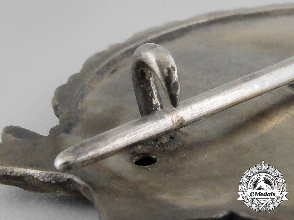 a_fine_quality_first_war_prussian_pilot’s_badge_by_c._e._juncker_in_its_original_case_of_issue_bb_1780