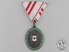 An Austrian Honour Decoration Of The Red Cross' Silver Medal With War Decoration