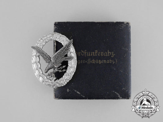 a_cased_luftwaffe_radio_operator_badge_by_hermann_aurich;_aluminum_version_bb_2666