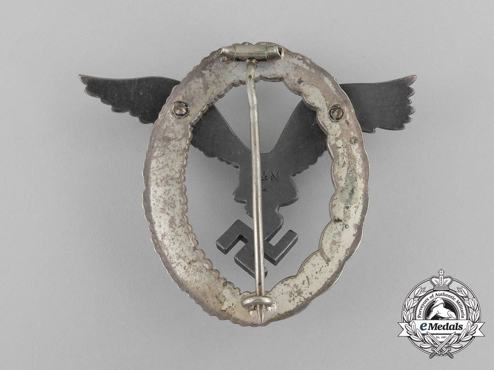 a_cased_early_quality_luftwaffe_pilot’s_badge_by_berg&_nolte_bb_2676