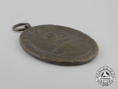 a_third_reich_period_german_defence_wall(_west_wall)_medal_in_its_original_packet_of_issue_bb_2856
