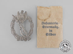 A Second War German Silver Grade Infantry Assault Badge In Its Packet Of Issue