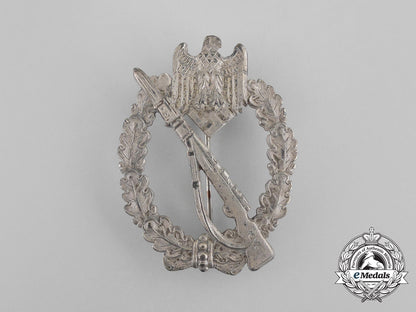 a_second_war_german_silver_grade_infantry_assault_badge_in_its_packet_of_issue_bb_2872