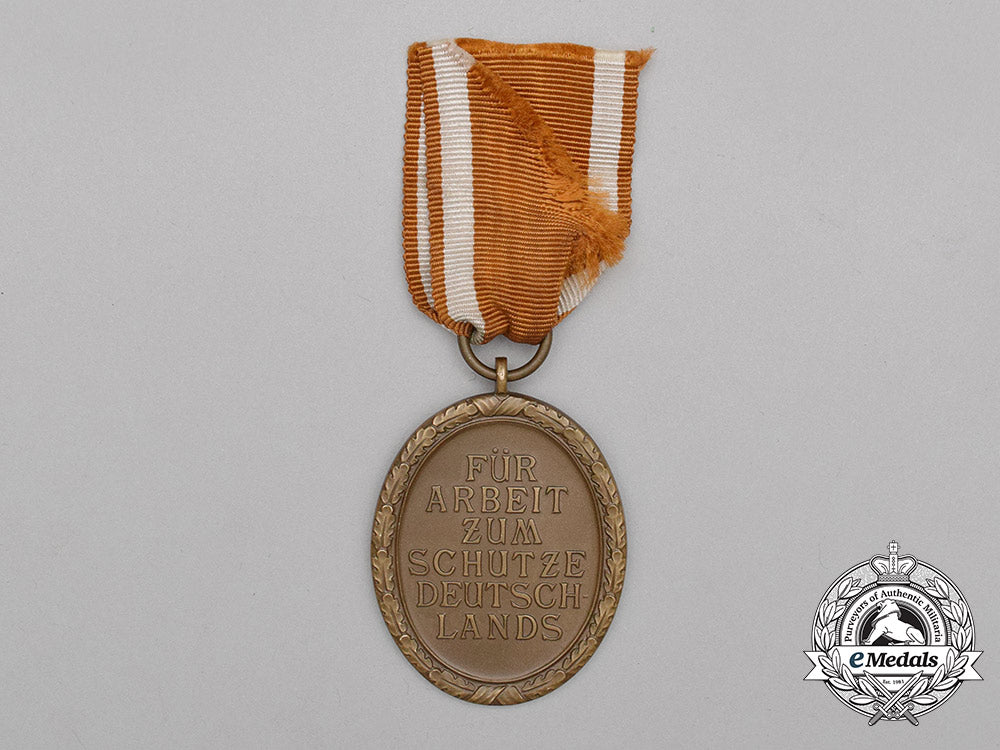 a_german_defence_wall(_west_wall)_medal_in_its_packet_of_issue_by_friedrich_orth_of_vienna_bb_3068