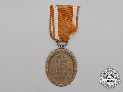 a_german_defence_wall(_west_wall)_medal_in_its_packet_of_issue_by_friedrich_orth_of_vienna_bb_3068