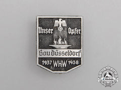 A 1937/38 Winter Relief Of The German People (Whw) “Our Sacrifice” Donations Badge