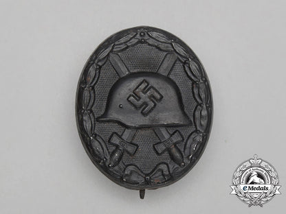 a_black_grade_wound_badge_with_packet_bb_3535